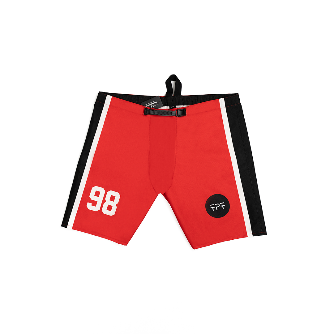Custom ice hockey pant shells – red and black team design