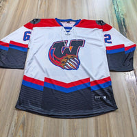 Custom sublimated hockey jersey front and back with personalized team design